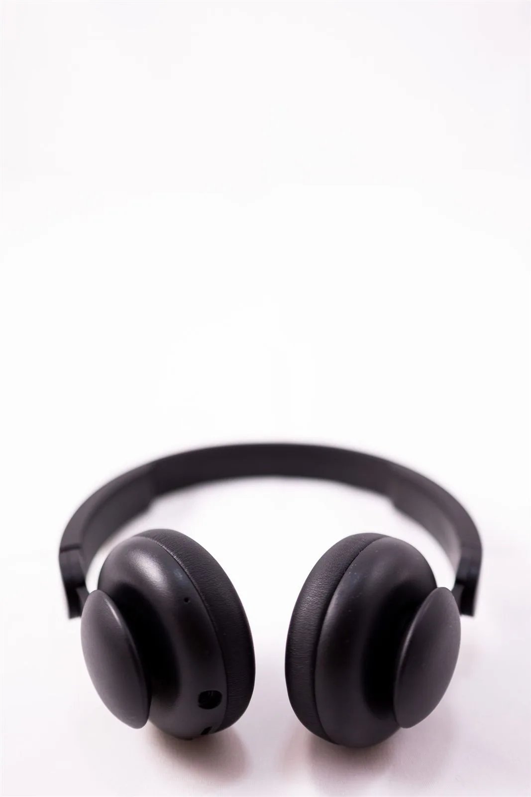 Black over-ear headphones H7 on white background