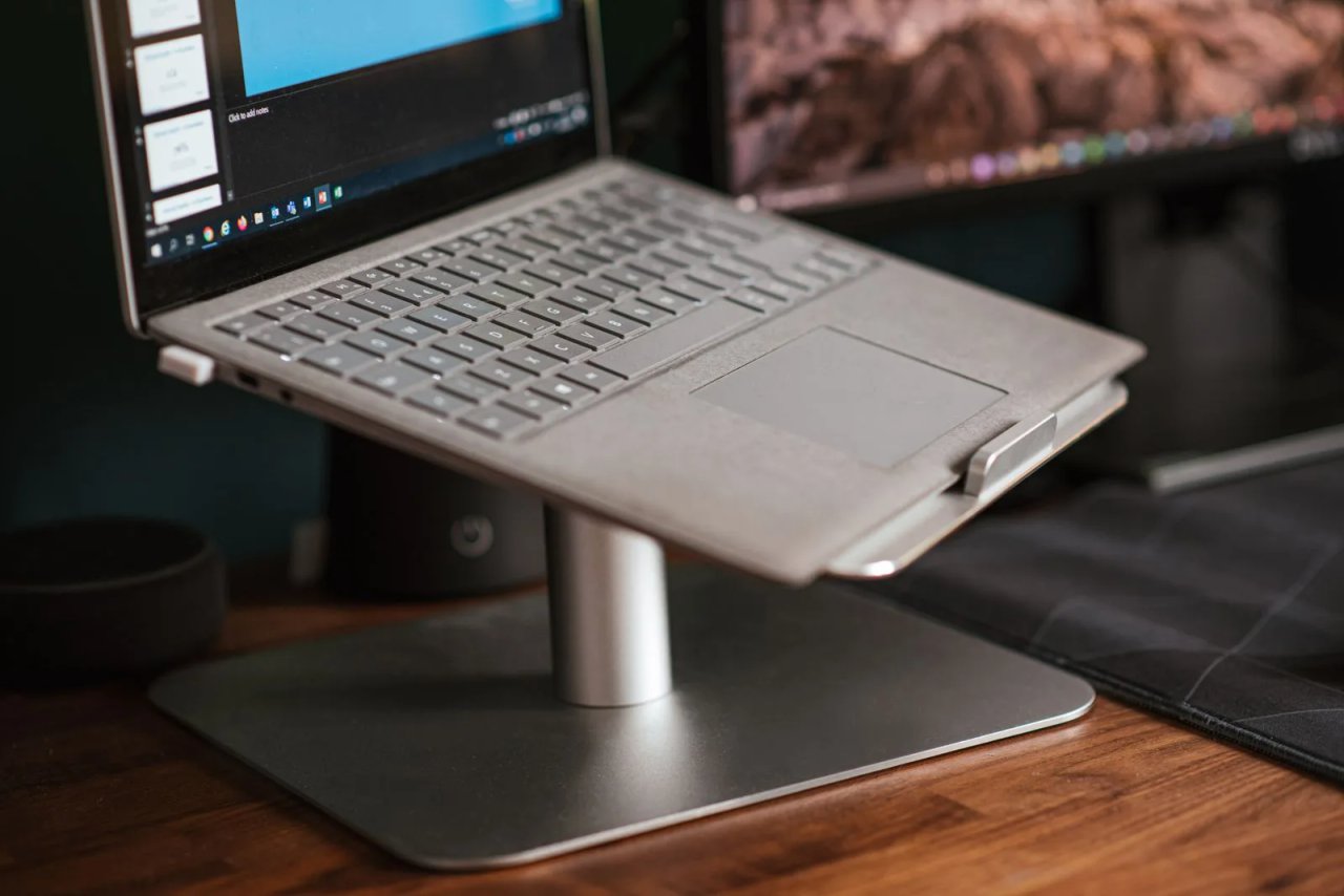 Laptop raised on an aluminium stand