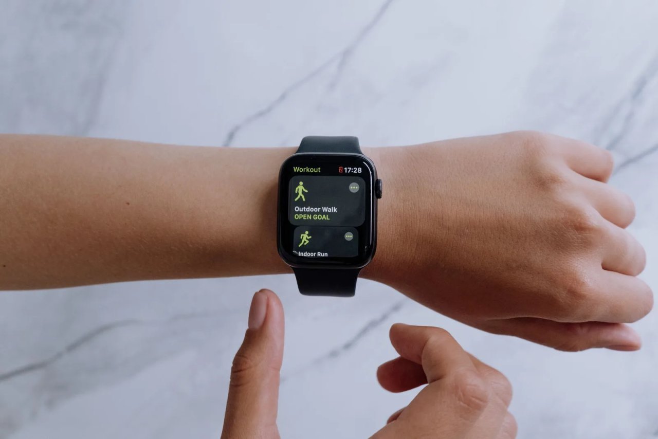 Smart Watch Fit S2 on a wrist showing fitness apps