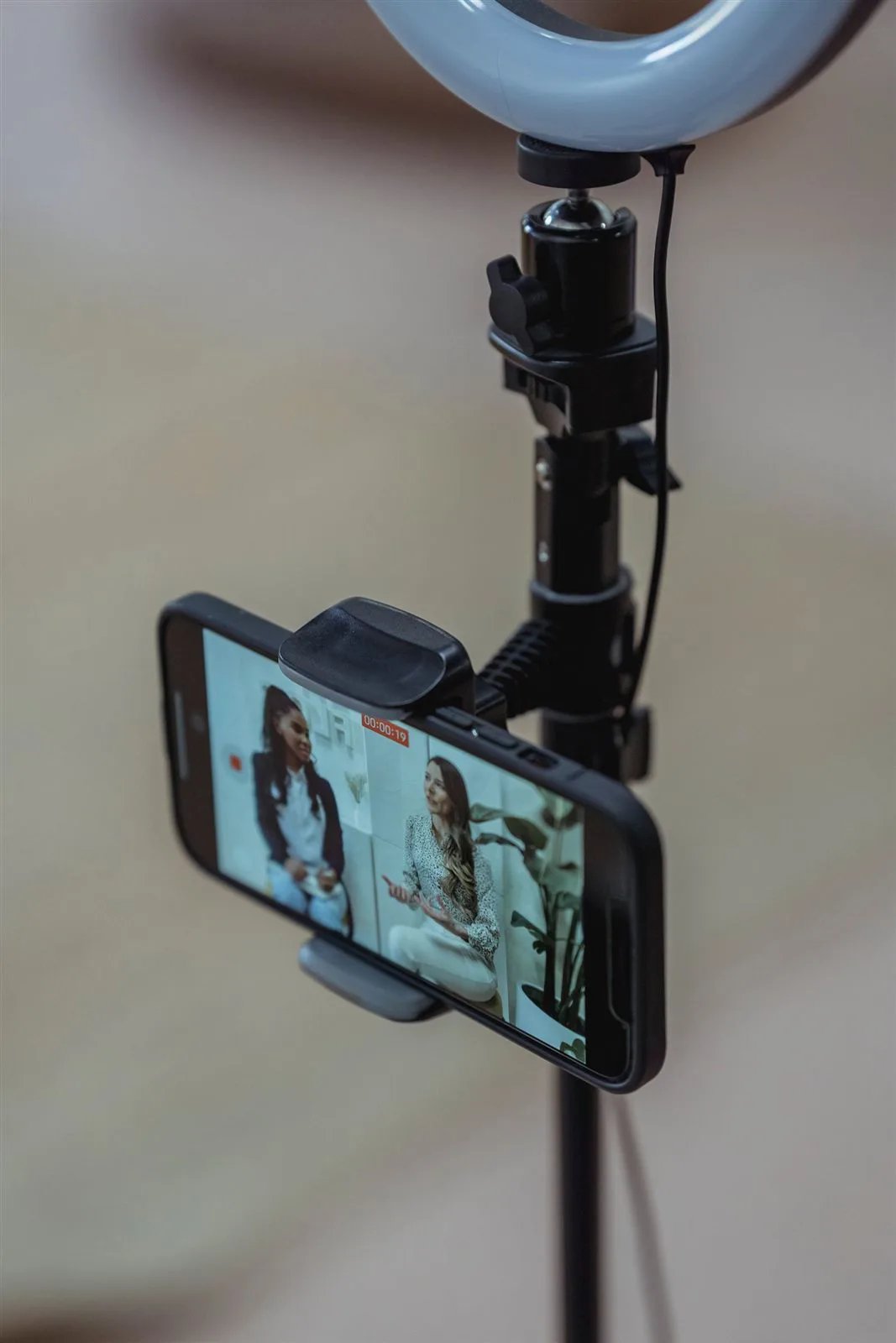 Phone on a stand with an LED ring light
